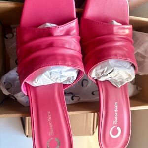 Brand new, never worn, slip on high heels.